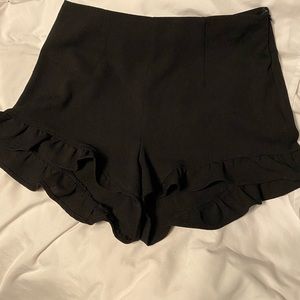 Lulu’s high-waisted ruffle trim shorts